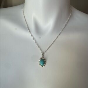 Elegant Silver and Turquoise Pendant Necklace